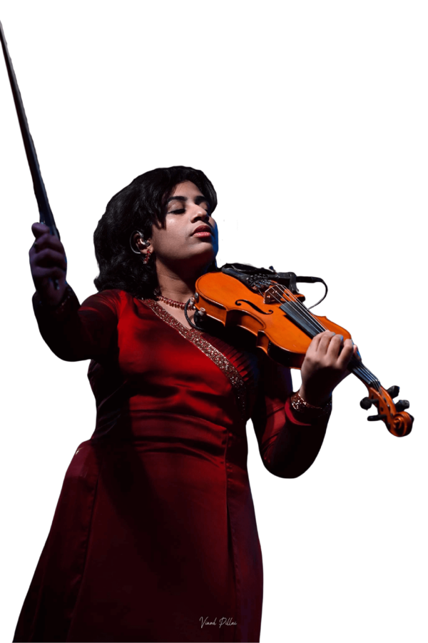 Veda Mithra playing the violin in a stunning red dress