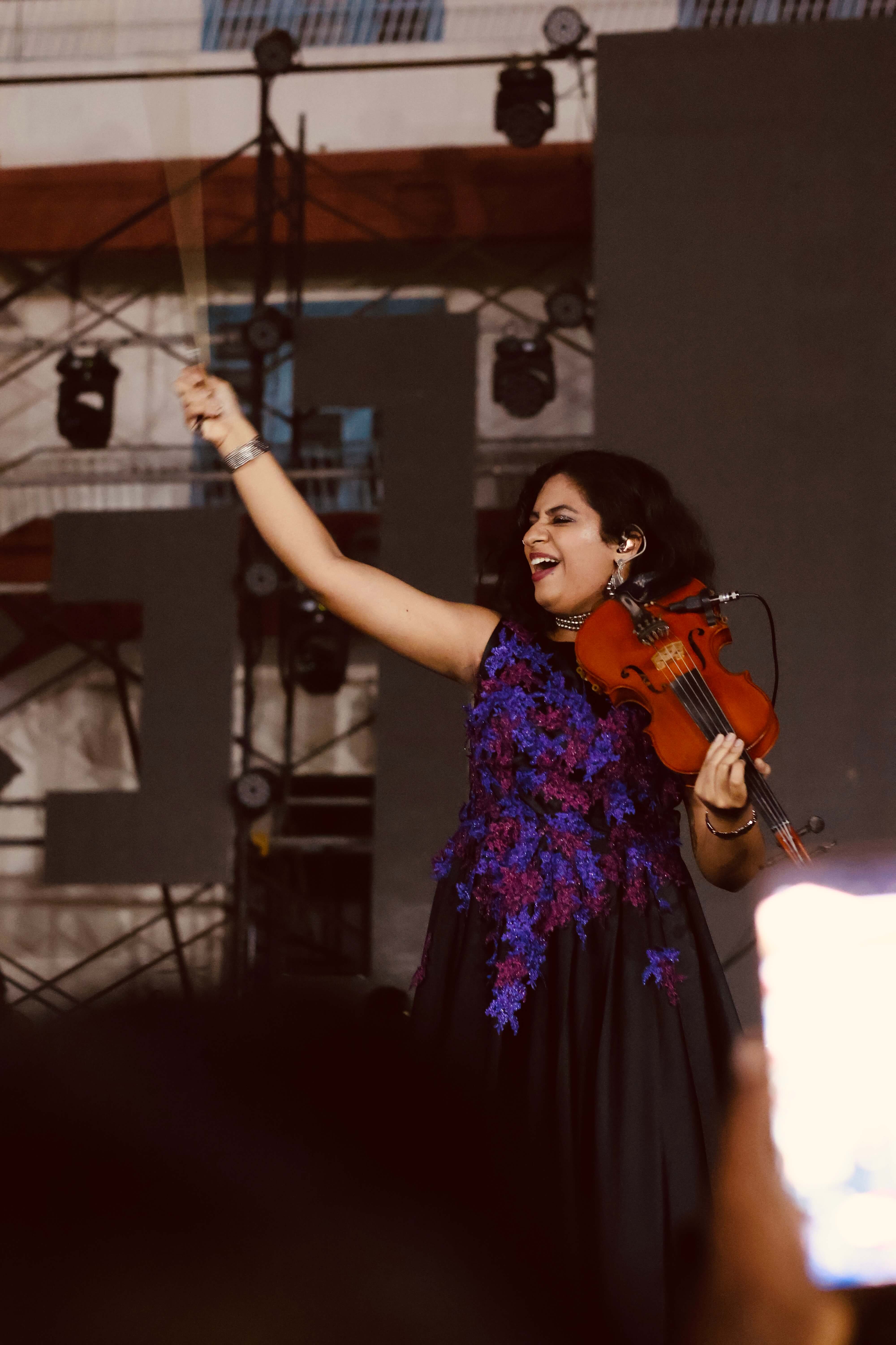 Arm raised with violin